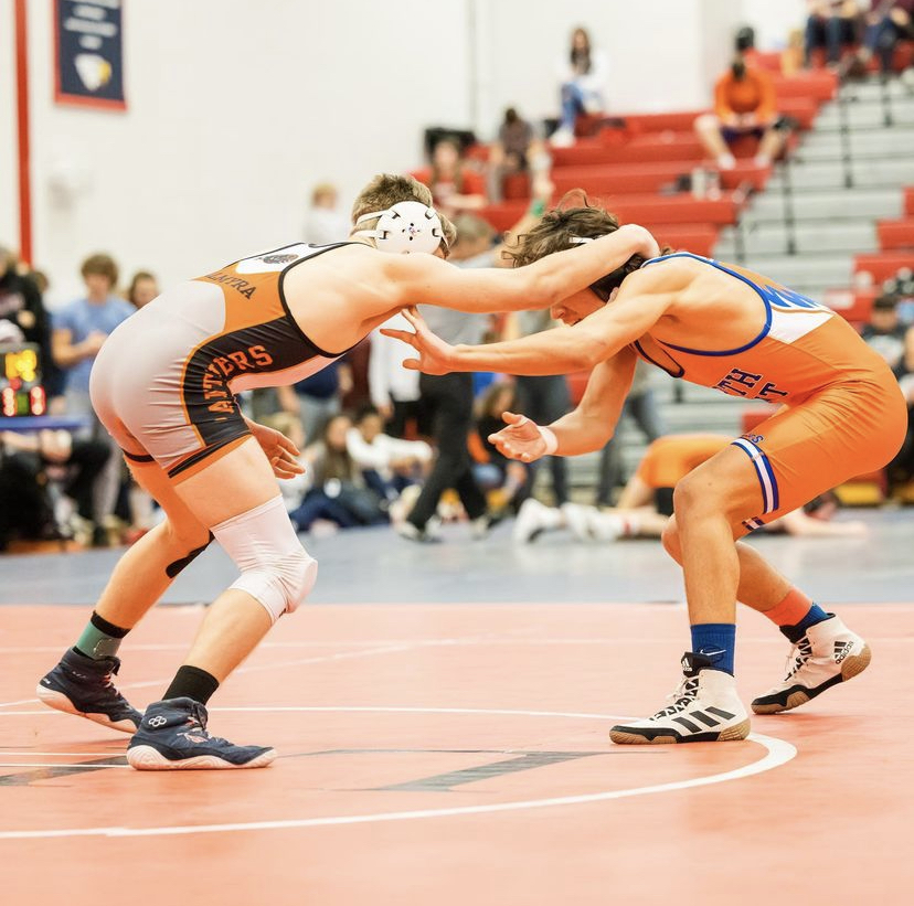 Christian Thomas attempts to take down his opponent at the Liberty Invitational. 