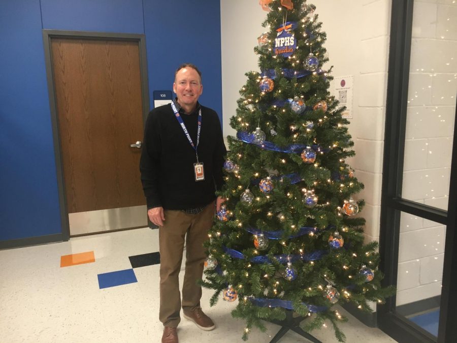 Our new assistant principal, Dr. Kraft, standing by our tree.