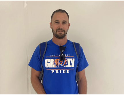 Coach Lacy is a new health and P.E. teacher who also coaches basketball.