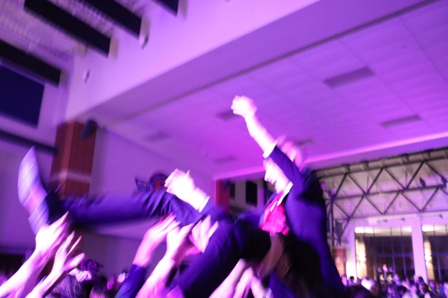Gavin April (24) enjoyed the homecoming dance as he crowd surfed and let a side out that many had not seen before.