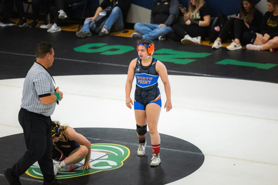 Cassidy Benwell (24) wrestles her way to state two years in a row.
