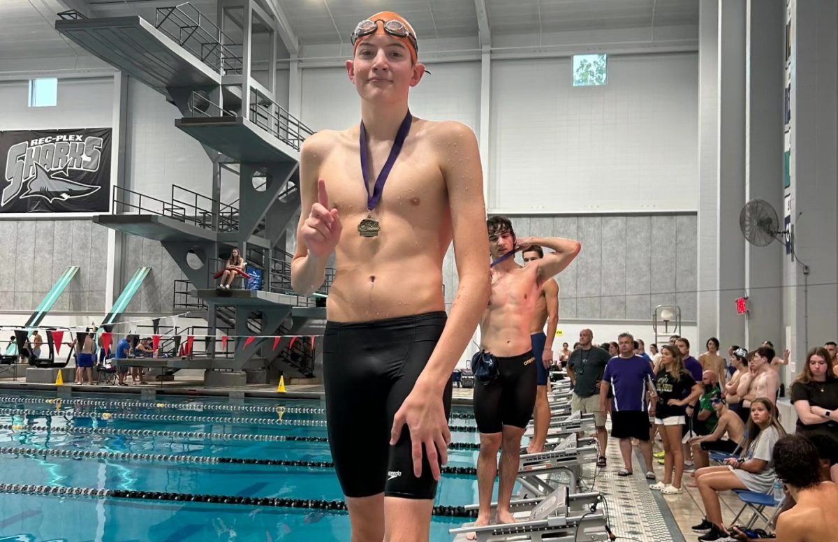 As a freshman, Cole Warnke, shattered two records placing first in both events.