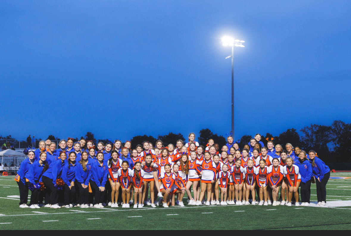 The Cheerleaders held a clinic for the junior Grizzlies and they performed together at the Homecoming Halftime.