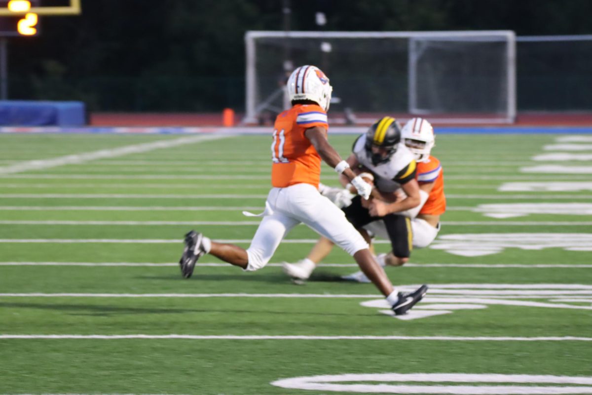 Defensive back, Michael Wright, gets ready for the tackle.