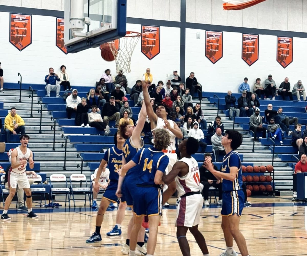 The boys team guards against Francis Howell to shoot a basket