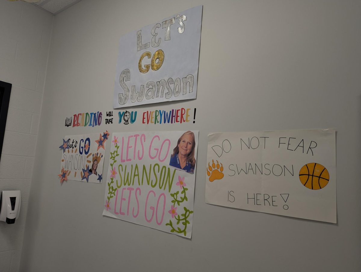 Make posters or signs to cheer on your favorite staff member or senior at the Swofford Game.