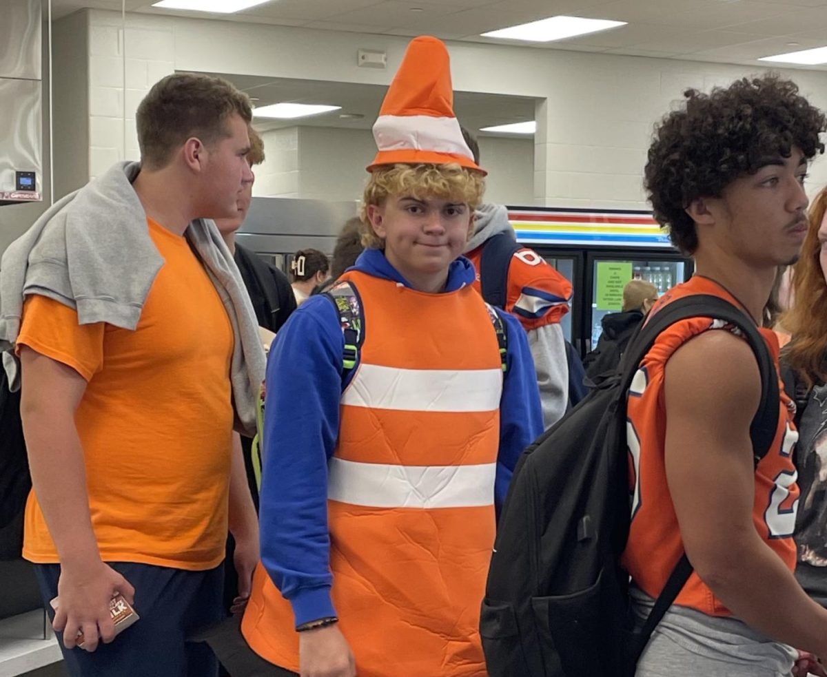 Our STUCO president, Reid Struckman ('26), dresses as a traffic cone for one of the football games that had construction as the theme.