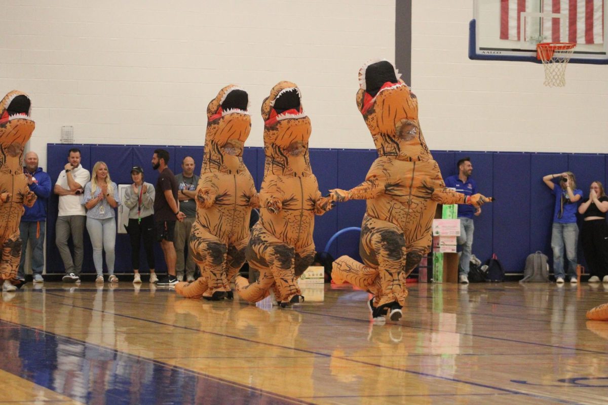 At the pep rally, after the HOCO theme ws announced, the dinosaurs kept coming.