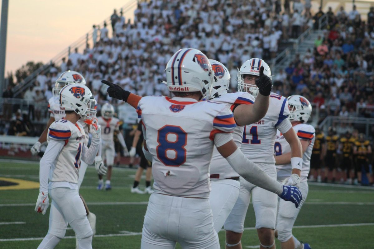 The team celebrates a good play after the first game of the season against the Knights. 