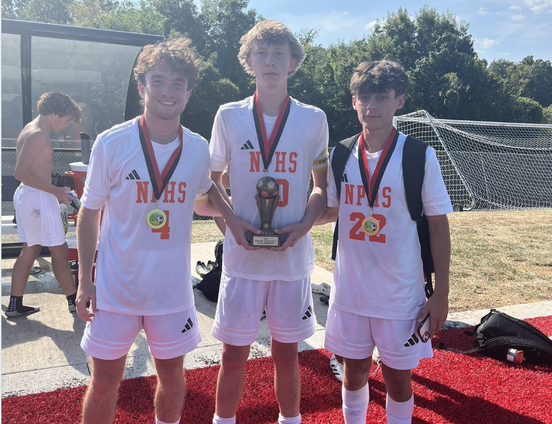 Luke Hodge ('26), Dalton Albers ('26) and Andrew Dean ('27) receive All Tournament Player awards with a big win at the Hannibal Soccer Tournament.