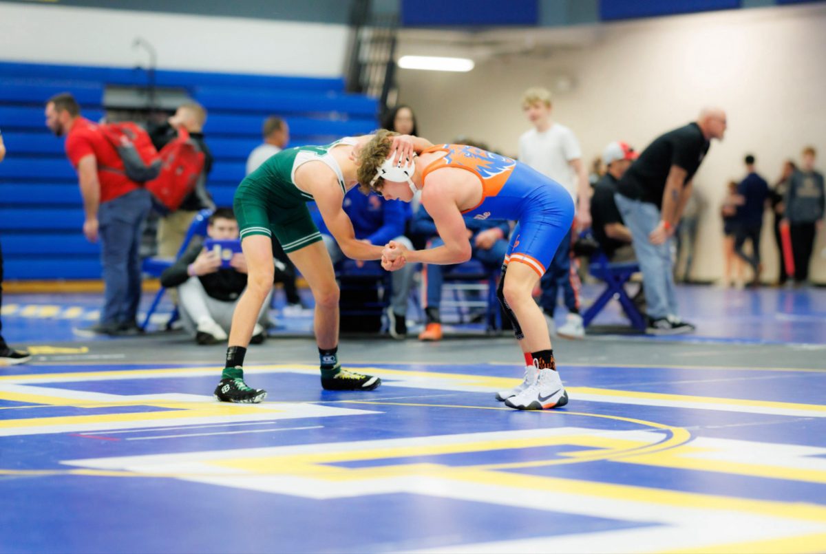 Dominic Holste ('27) wrestles at GACs against Fort Zumwalt North last year and cannot wait to take the mat this year.