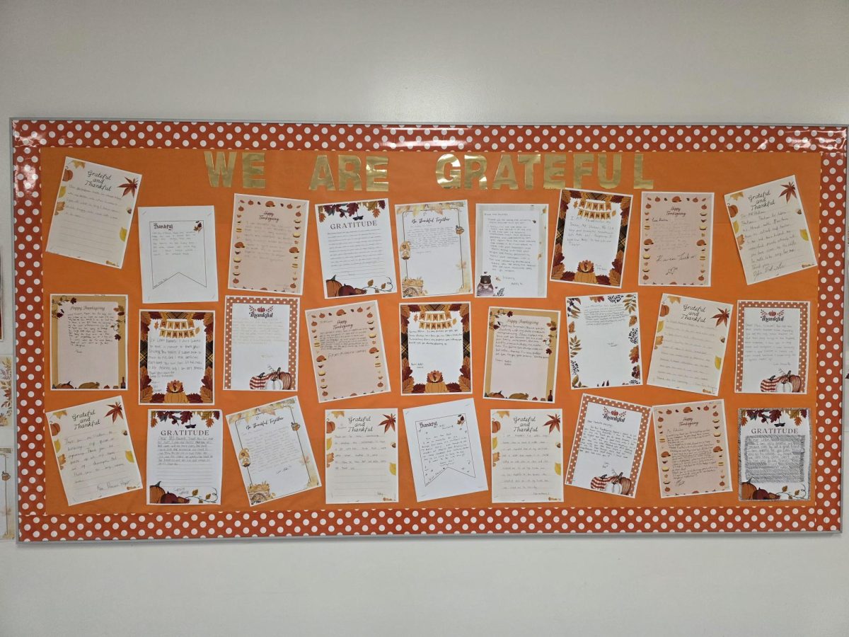 A board in the hallway of our schools showcases letters written by students to tell what they were thankful for.